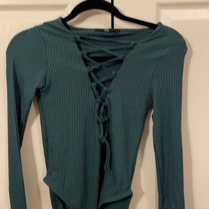 green bodysuit